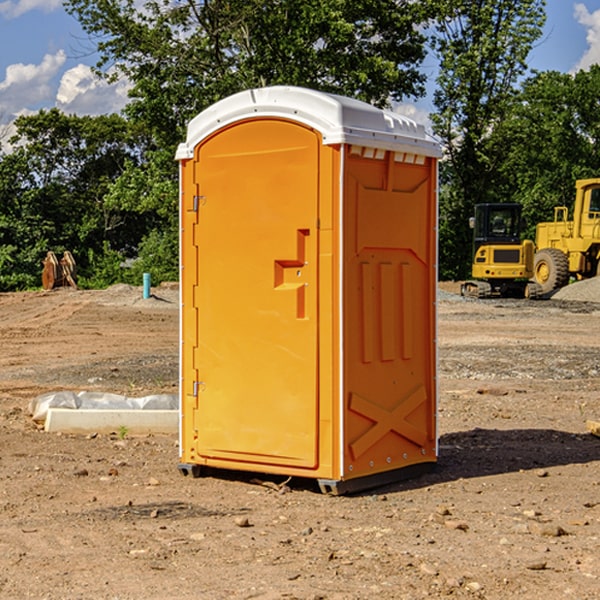 what is the cost difference between standard and deluxe portable restroom rentals in Shell Valley